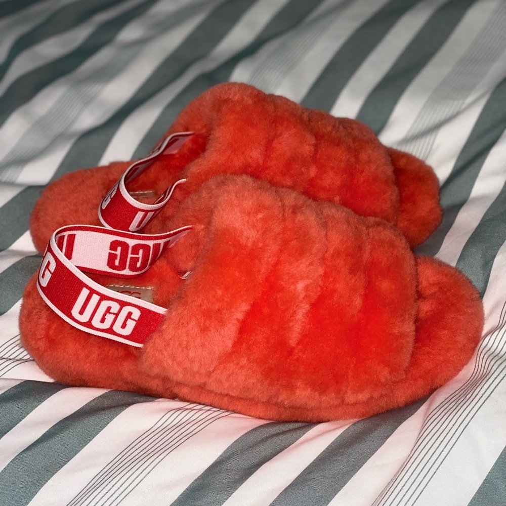 Bright orange Ugg sandals